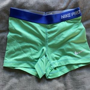 Nike pro shorts light green and purple size small